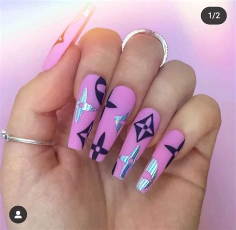 pink nails with louis vuitton on ring fingure|31 Must.